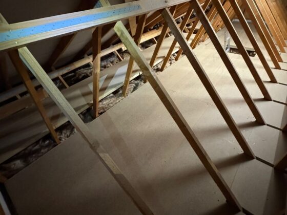 Raised loft boarding fitted over full-depth insulation