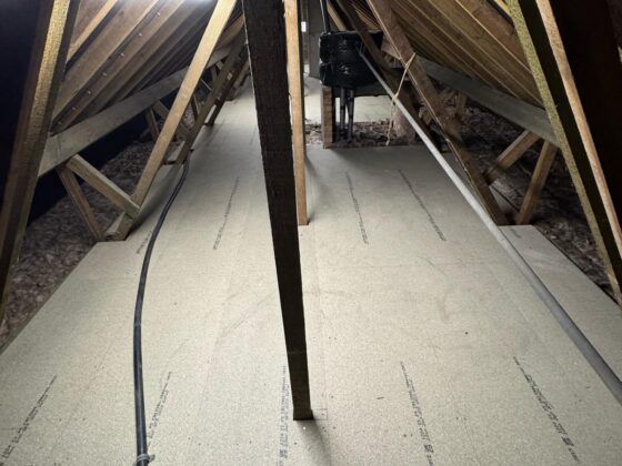 Raised loft boarding fitted over full-depth insulation