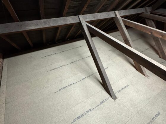 Raised loft boarding fitted over full-depth insulation