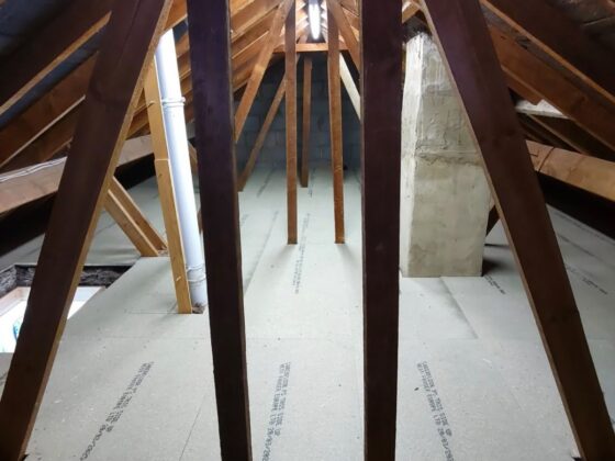 Raised loft boarding fitted over full-depth insulation