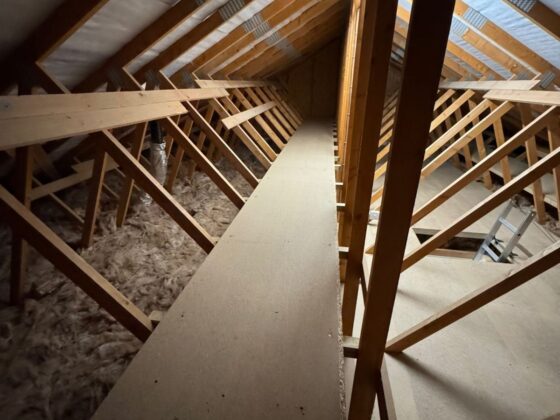 Raised loft boarding fitted over full-depth insulation