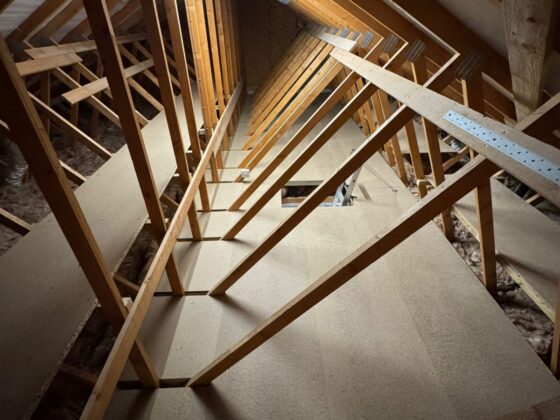 Raised loft boarding fitted over full-depth insulation