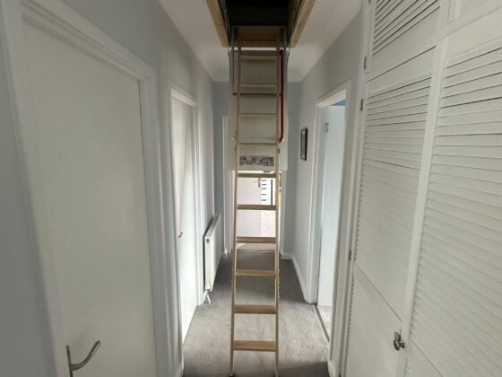 Loft ladder fitted and lowered onto the landing