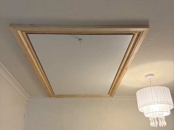 Insulated loft hatch finished flush with the ceiling