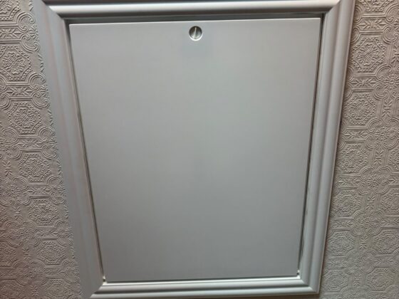 Insulated loft hatch finished flush with the ceiling
