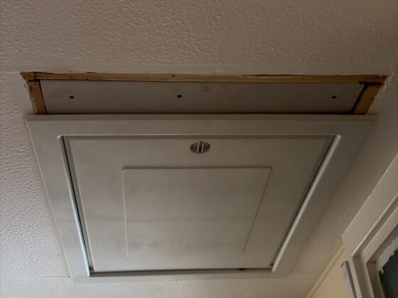 Insulated loft hatch finished flush with the ceiling