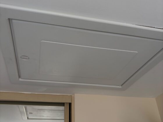 Insulated loft hatch finished flush with the ceiling
