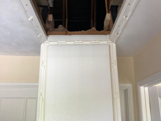 Loft ladder fitted and lowered onto the landing