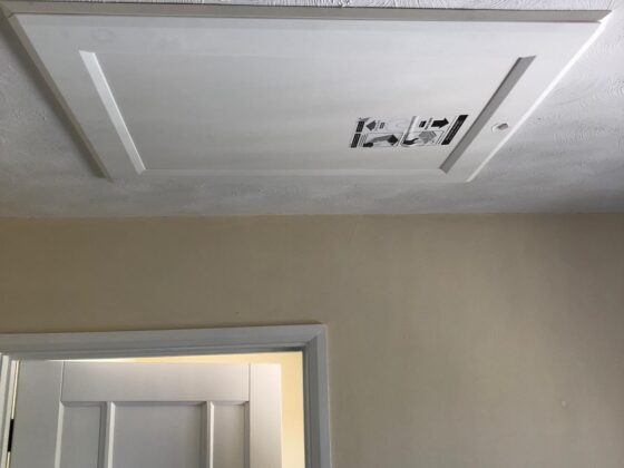 Insulated loft hatch finished flush with the ceiling