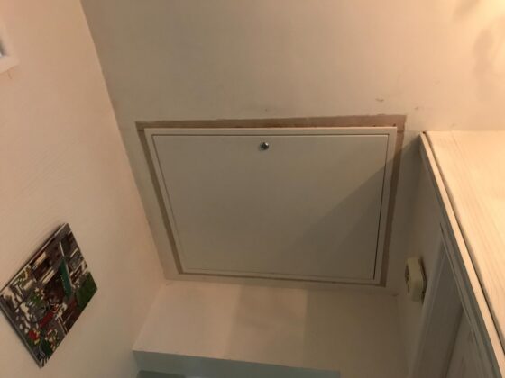 Insulated loft hatch finished flush with the ceiling