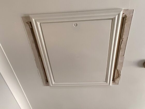 Insulated loft hatch finished flush with the ceiling