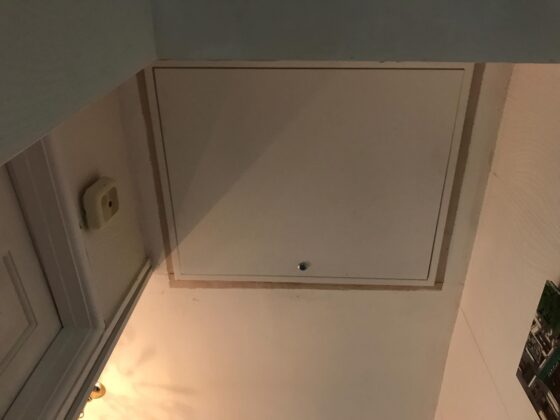 Insulated loft hatch finished flush with the ceiling