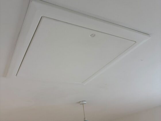 Insulated loft hatch finished flush with the ceiling