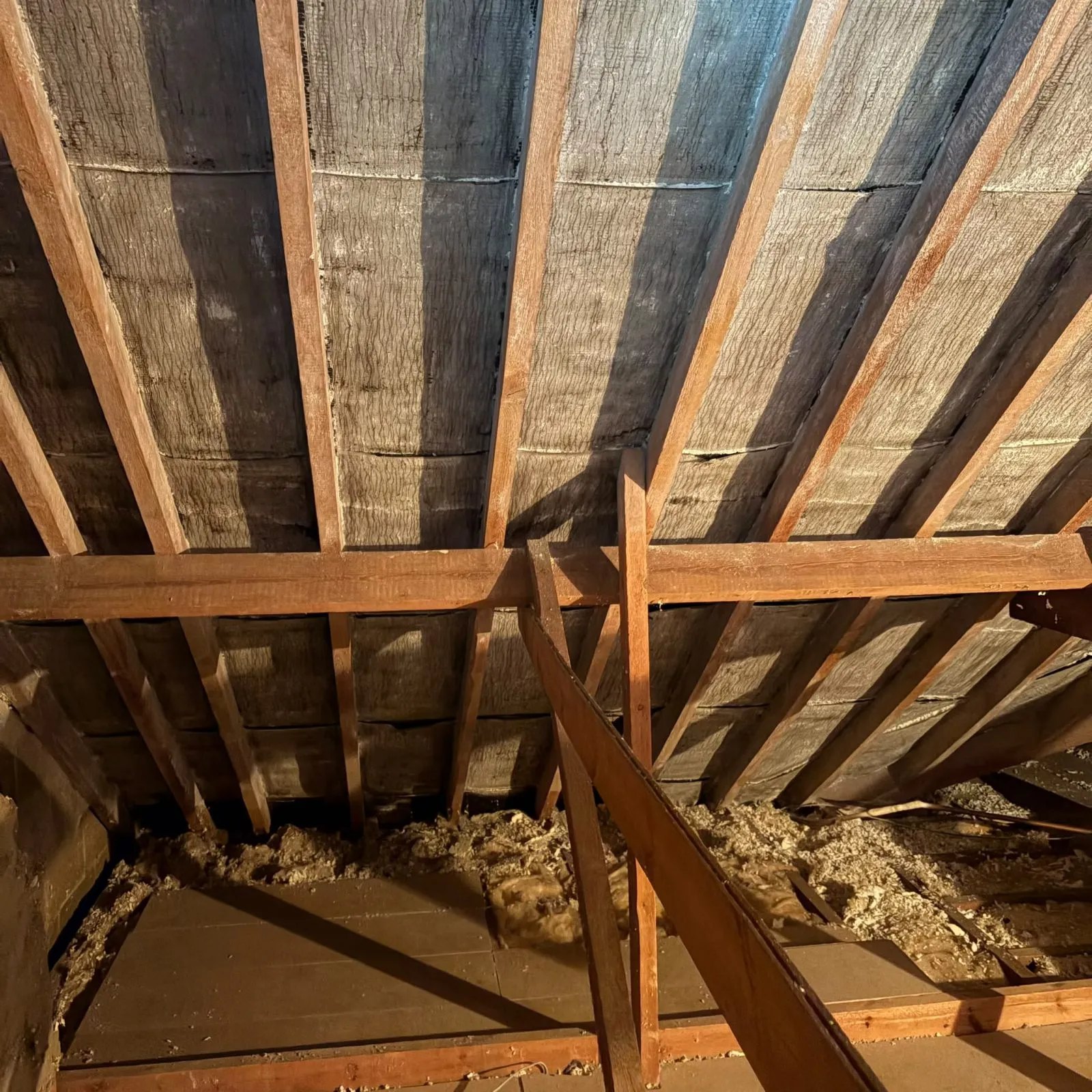 Roof timbers stripped back and left clear after removal work